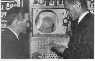 Tom Kilburn & Freddie Williams at the control panel of the SSEM